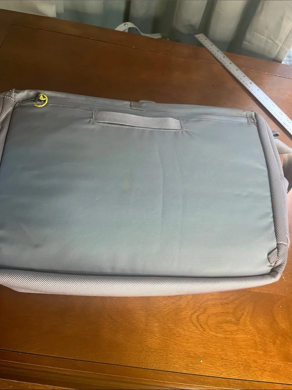 Marmot Light Gray Roll-Top Laptop Messenger Bag with Yellow Accents